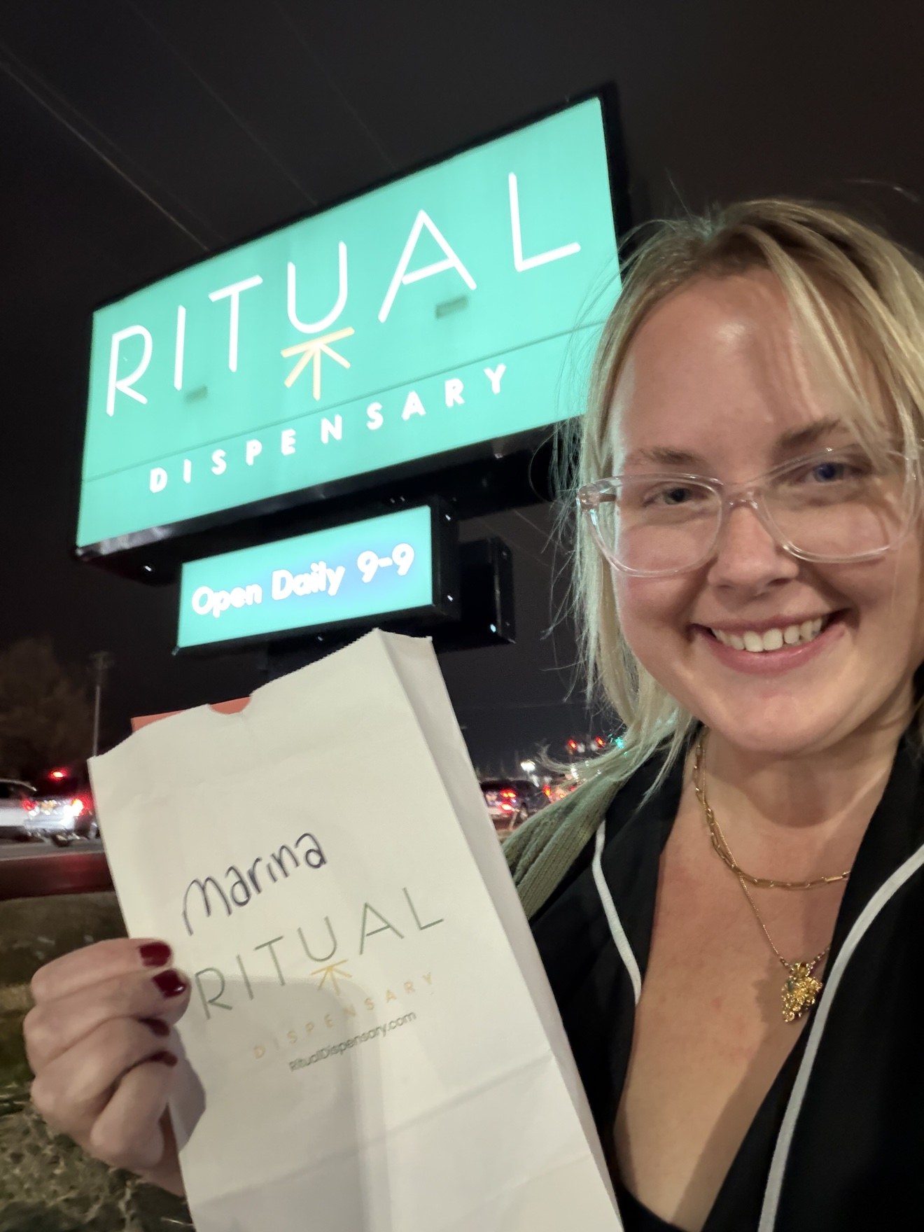 Marina at the Ritual dispensary sign, Glen Burnie